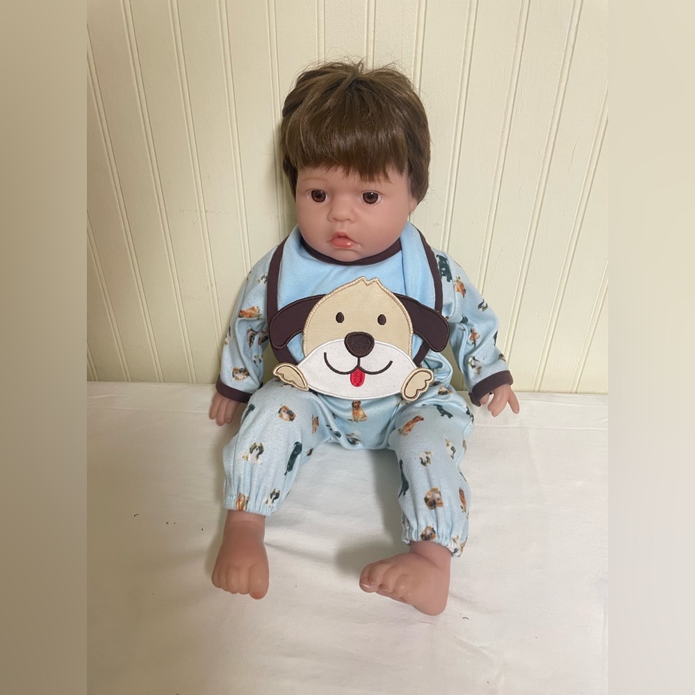 Adorable Used Baby Doll in Blue Puppy Dog Sleeper